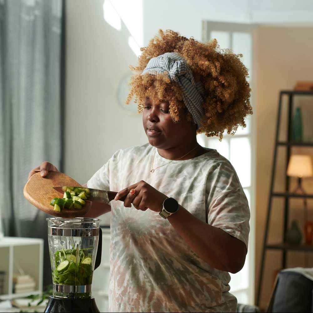 Woman making healthy food at home